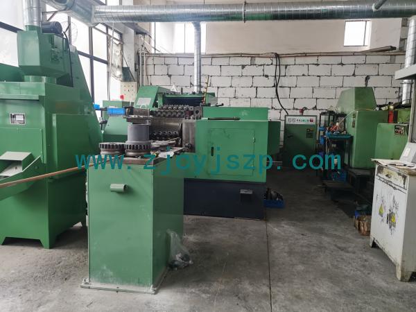 Multi-station cold heading machine